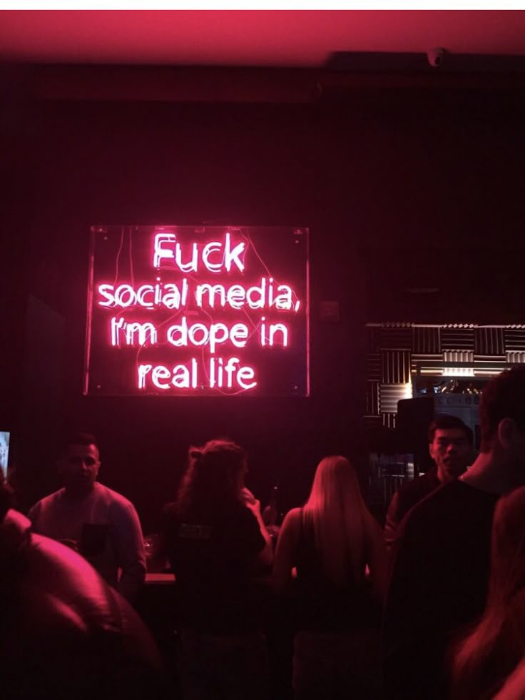 a neon sign that says flick social media, i'm dope in real life