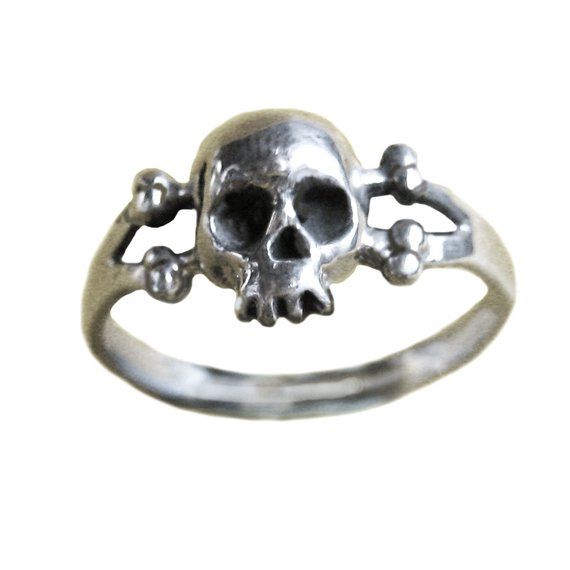 So delicate from afar people will think you're a good girl. And then they get to know you...Dimensions:  Skull measures 10mm tall.Materials: Sterling Silver: Solid sterling silverGold Plate: 14K gold plate over sterling silver10K Gold: Solid 10K gold14k Gold: Solid 14K goldIf you would like this ring in a metal or size that you don't see listed just send us an email and we can probably make it custom for you. anomalyjewelry@gmail.comAll jewelry made in N.Y.C. by my hands at the time of purchase Adjustable Skull Print Rings For Gift, Nickel-free Skull Rings For Gift, Sterling Silver Skull Print Rings As Gift, Sterling Silver Rings With Skull Print For Gift, Afar People, Pirate Accessories, Nyc Studio, Bone Jewelry, Funky Jewelry