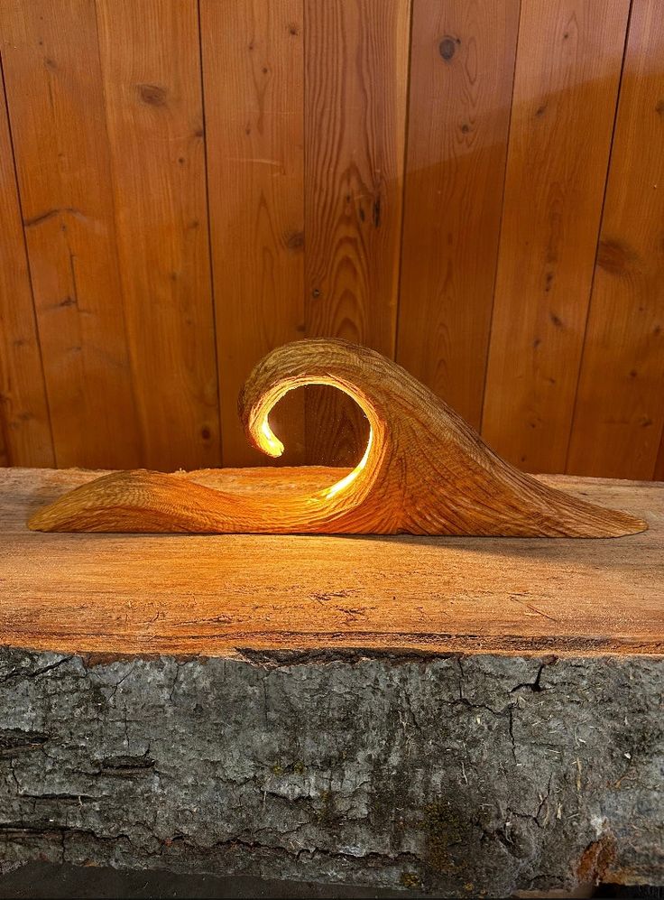 a piece of wood that has been carved to look like a wave