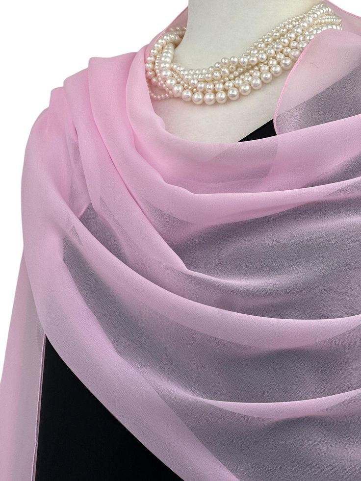 Elevate your style with our exquisite collection of chiffon shawls. Our chiffon shawls are the epitome of elegance and versatility, designed to effortlessly enhance your wardrobe and leave a lasting impression. Made from the fine poly chiffon fabric, these shawls offer a delicate and airy drape that adds a touch of grace to any outfit. Whether you're attending a special occasion, a casual gathering, or simply want to elevate your everyday look, our chiffon shawls are the perfect accessory. Choos Elegant Sheer Dupatta For Formal Occasions, Elegant Silk Chiffon Dupatta For Wedding, Elegant Silk Chiffon Wedding Dupatta, Elegant Pink Dupatta For Evening, Elegant Silk Shawl Scarf As Gift, Elegant Evening Shawl Dupatta, Elegant Organza Dupatta For Evening, Elegant Chiffon Dupatta For Party, Elegant Formal Chiffon Dupatta