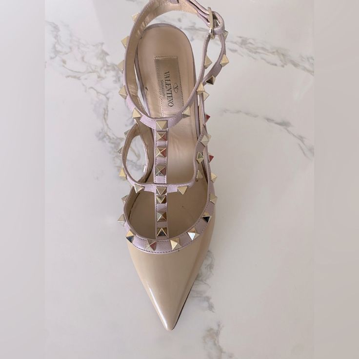 Valentino’s Sexy Classic Rock Stud Heels. Nude. Size 7. 100 Mm 3.5 Cm. Red Carpet Favorite. Instead Smoke Show! Worn Twice. Includes Original Box And Dust Bag. Valentino Rock Studs, Stud Heels, Studded Heels, Valentino Shoes, Classic Chic, Classic Rock, Shoes Women Heels, Red Carpet, Original Box