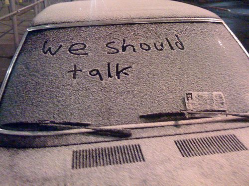 we should talk written on the windshield of a car