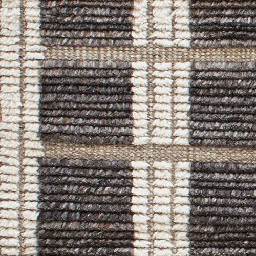 a close up view of the checkerboard pattern on a fabric material that has been woven