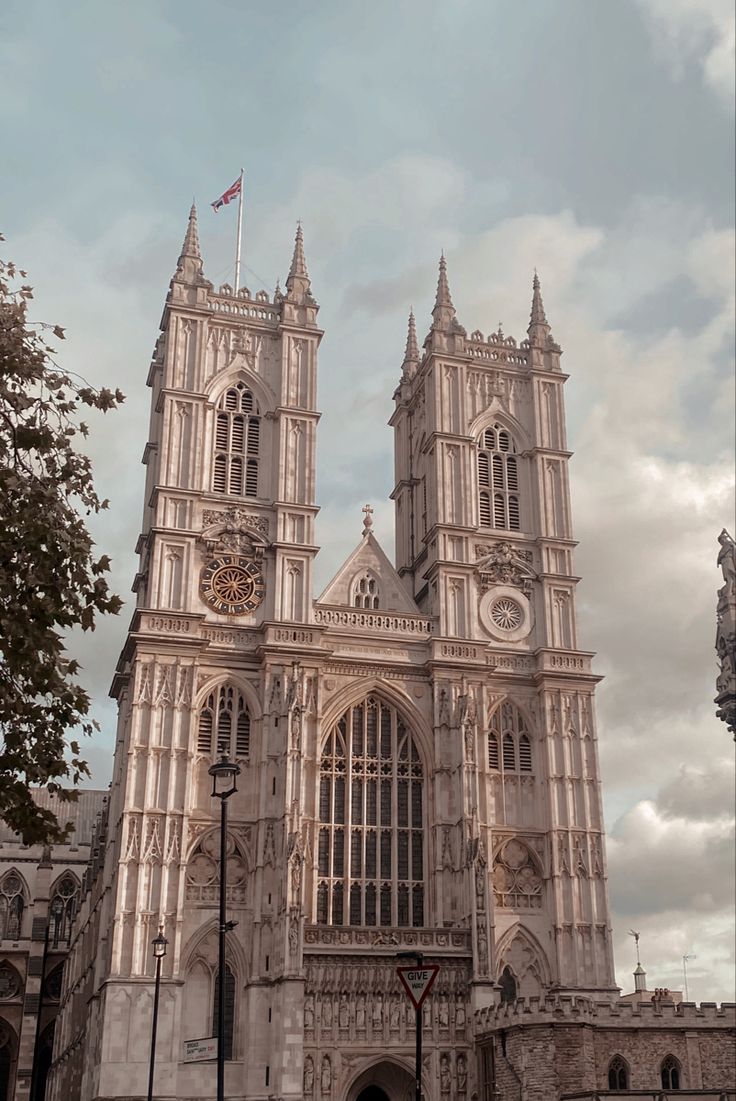 the large cathedral has two clocks on it's front and side towers that point toward the sky