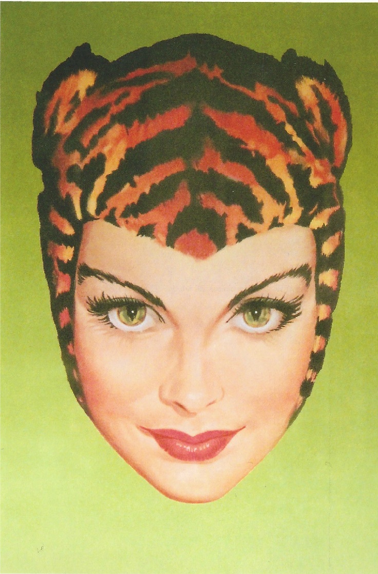 a woman's head with an animal print on it