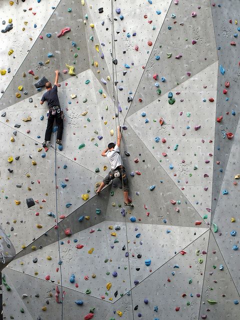 two people climbing up the side of a wall with text overlay that reads bucket list 80 rock climbing