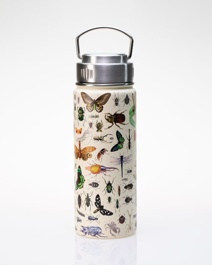 a stainless steel water bottle with butterflies and bugs on the front, sitting on a white surface