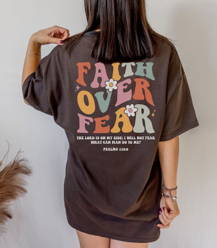 Spread Love and Faith with this Trendy Christian Shirt with quote "Faith Over Fear". This is a great gift for any bible lover or spiritual woman. Get yours now! Also available on tshirt, sweatshirt and hoodies: https://www.etsy.com/shop/TheNims?search_query=Faith+Over+Fear For other Christian items, click here: https://www.etsy.com/shop/TheNims?search_query=Christian Browse through my other awesome items here: http://thenims.etsy.com/ UNISEX TEES Gildan 5000™ (CUSTOMER FAVORITE) * 100% Cotton (f Christian Streetwear, Faith Over Fear Shirt, Faith Tshirts, Christian Tshirt Design, Jesus Clothes, Faith Over Fear, Streetwear Tshirt, Jesus Shirts, Streetwear Outfits