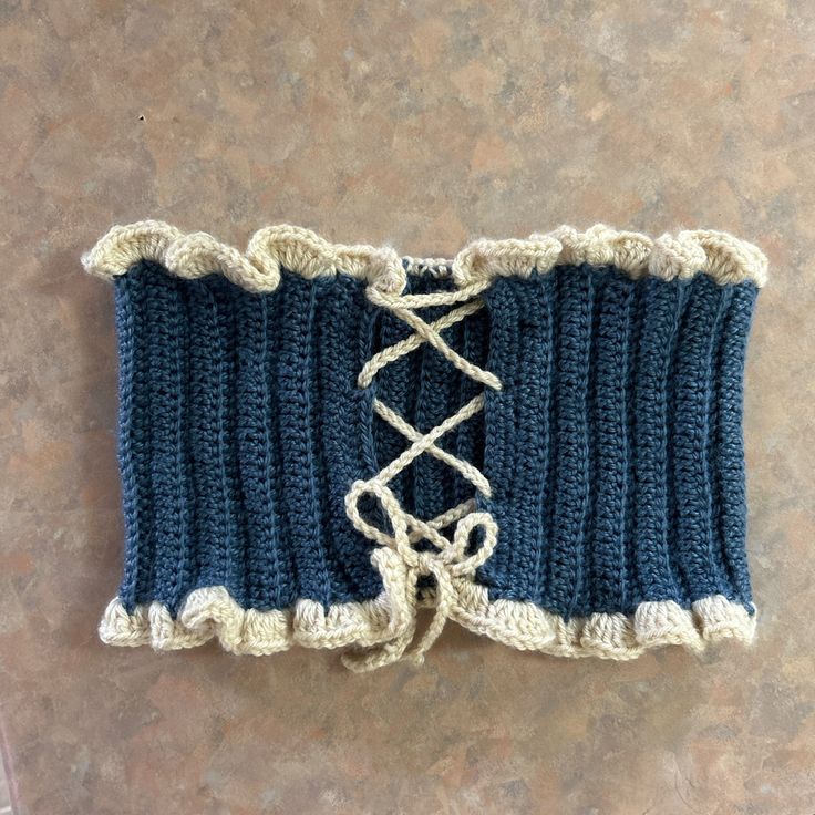 Cute navy/ivory crochet corset top Crochet A Corset Top, Corset Pattern Crochet, Crochet Corset Back, How To Crochet A Corset, Knitted Corset Top, Free Crochet Corset Patterns, Crochet Tulip Corset, Crochet Top Corset, Crochet Corsets