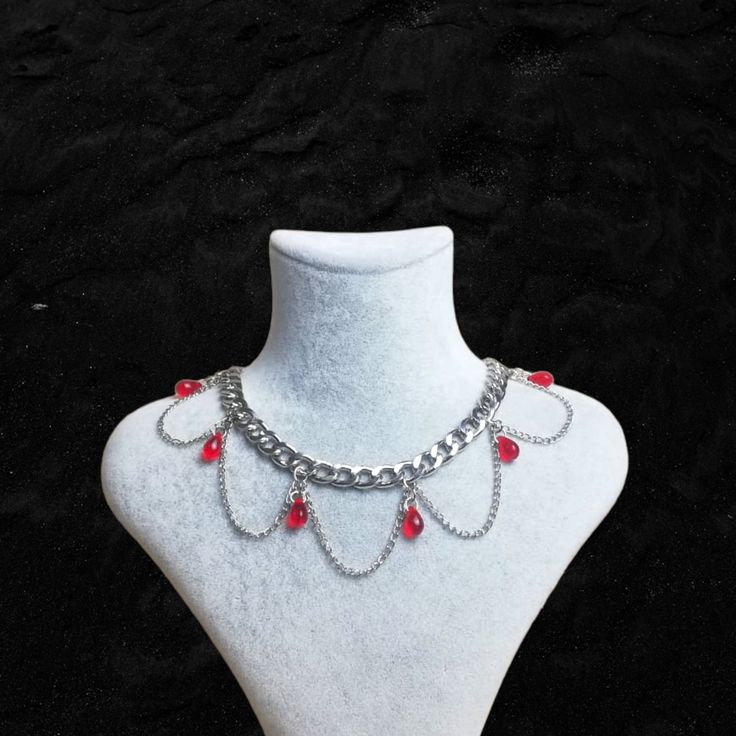 ▪Grunge Choker▪ Gothic design formed by the combination of red and chain ❤ Really cool chunky chain choker necklace ▪ 35 cm and adjustable ▪ It is handmade 🖤 ▪ If you have any questions, I'll be happy to answer 💌 ▪ Avoid contact with perfume or other chemicals 🌿 Emo Metal Necklace For Festivals, Emo Style Festival Jewelry With Chain, Grunge Chain Necklace For Concert, Emo Style Jewelry With Adjustable Chain For Concerts, Emo Metal Necklace For Concerts, Red Gothic Metal Necklace, Emo Metal Chain Necklaces, Emo Metal Chain Necklace, Emo Style Metal Necklace For Concerts