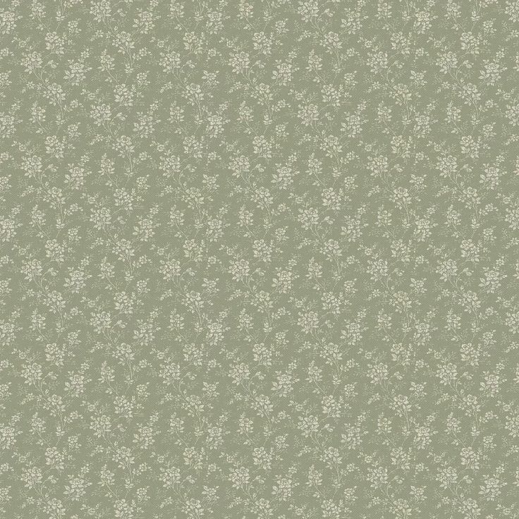 a green and white wallpaper with small flowers on the bottom half of it's surface