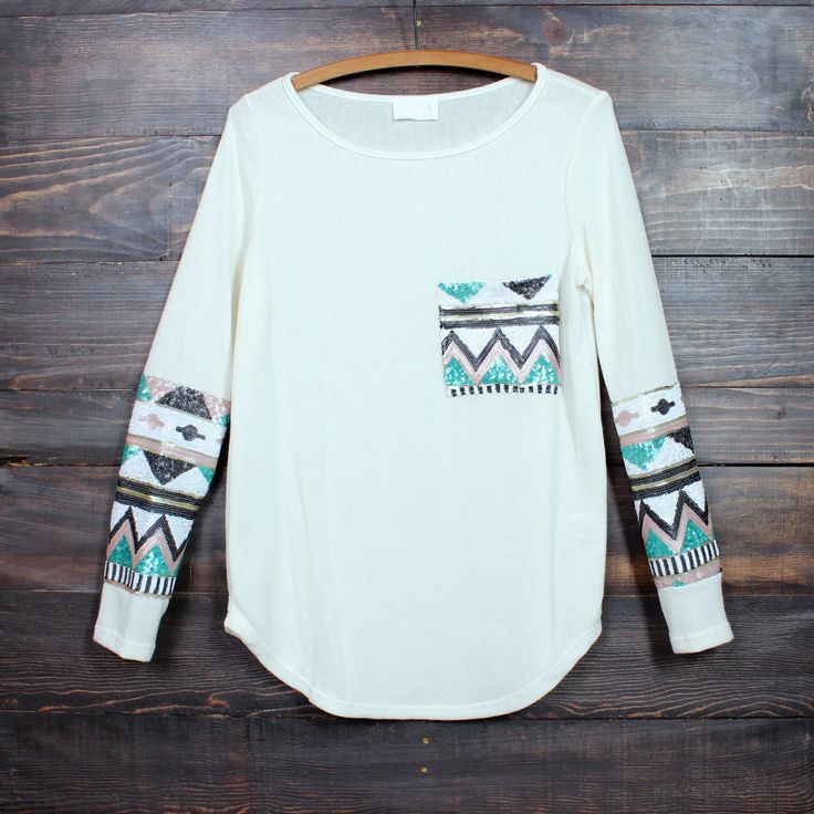 Soft oversize tunic with sequin pocket and sleeves in mint, ivory, or peach. Round bottom u-hem. Unlined. Color: sand, turquoise, ivory sand, turquoi Aztec Sleeve, Mint Green Tops, Oversized Tunic, Color Sand, Mode Inspiration, Made With Love, Cute Tops, Cute Shirts, With Love