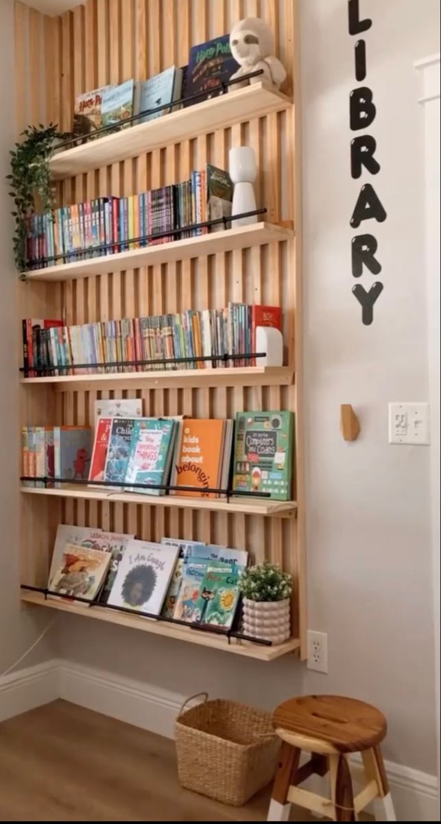 a wooden book shelf with books on it