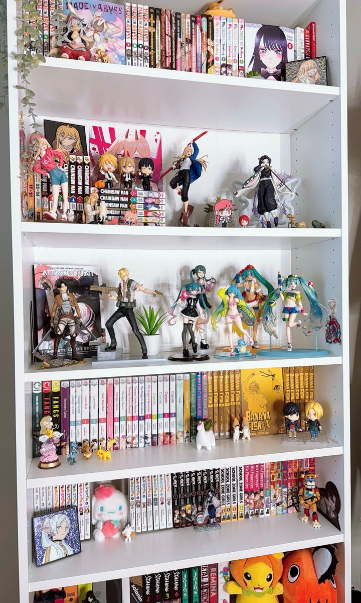 a white book shelf filled with anime figurines