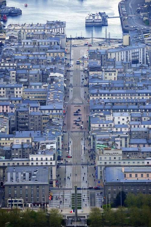 an aerial view of a city with lots of buildings