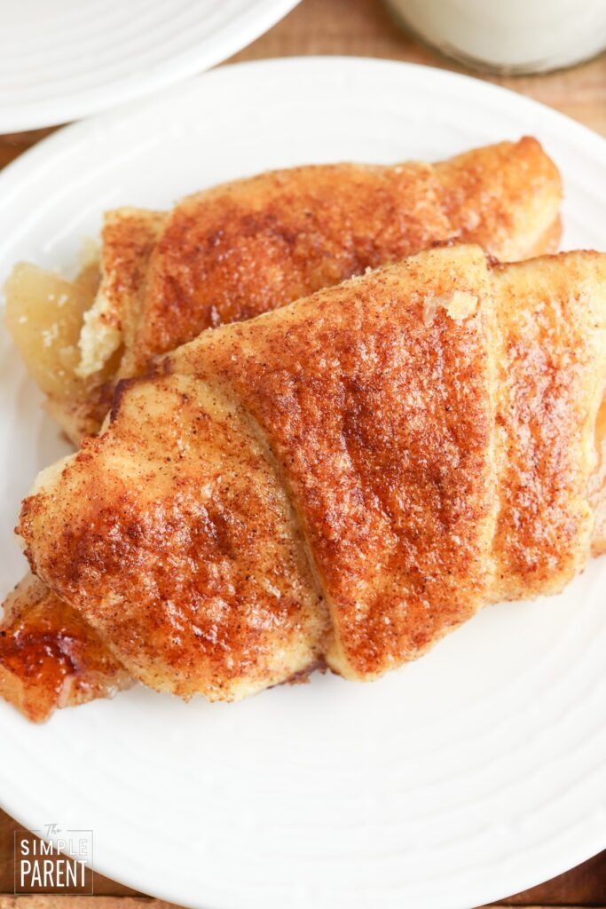 two pieces of french toast on a white plate