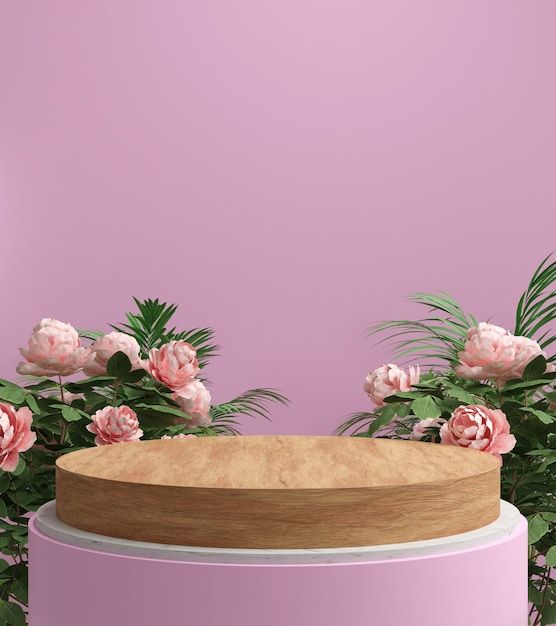 a round wooden table surrounded by flowers and greenery on a pink background with an empty space in the middle