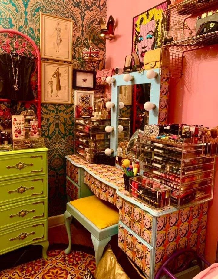 a room filled with lots of colorful furniture and decor