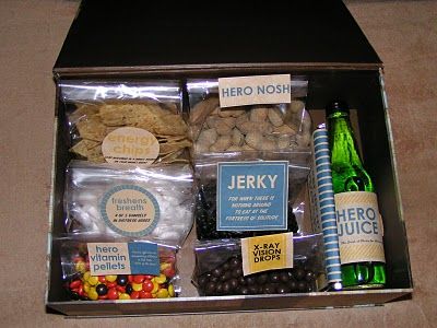 an open box filled with snacks and drinks