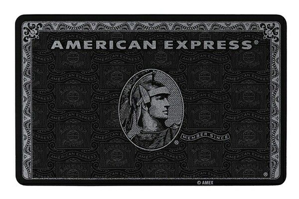 an american express credit card with the image of a man's head on it