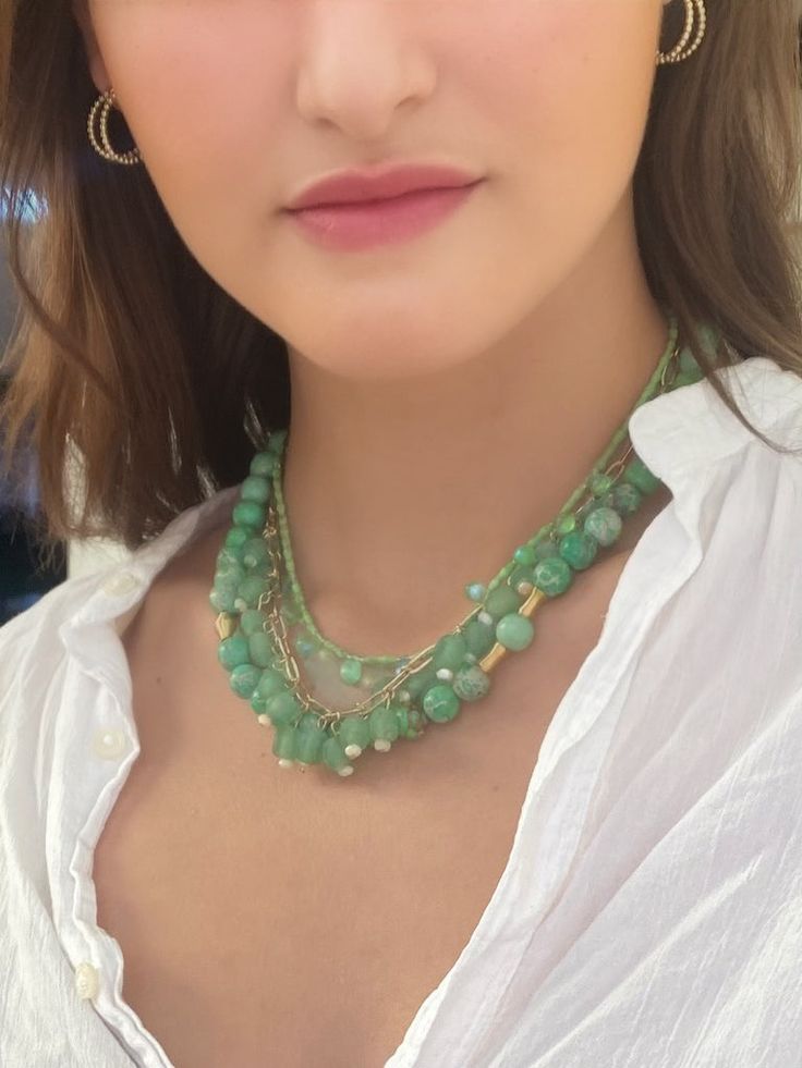 Embrace the allure of Jade and the uniqueness of the design with this necklace, making it a captivating statement piece that effortlessly draws attention and admiration. The necklace boasts a comfortable length that gracefully rests around the collarbone, making it an ideal accessory for various occasions. Whether you're attending a formal event or dressing up a casual outfit, this necklace effortlessly complements your style. (Note: As each necklace is handcrafted using natural materials, sligh Luxury Green Beaded Statement Necklace, Glass Beads Necklace, Sandy Shores, Recycled Glass Bead, Green Aqua, Rice Bead, Jasper Necklace, Necklace Making, Jasper Beads