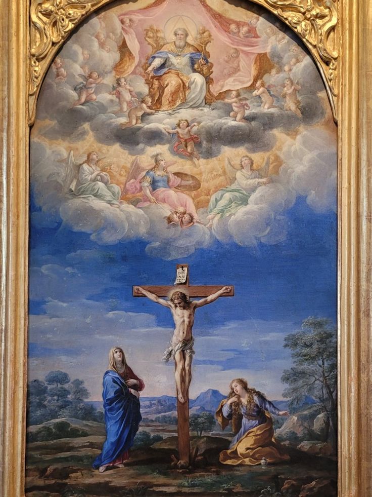 an ornate painting depicting jesus on the cross