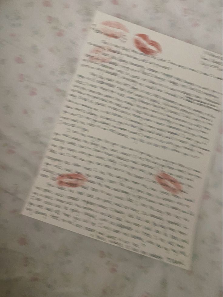 a piece of paper with lipstick prints on it