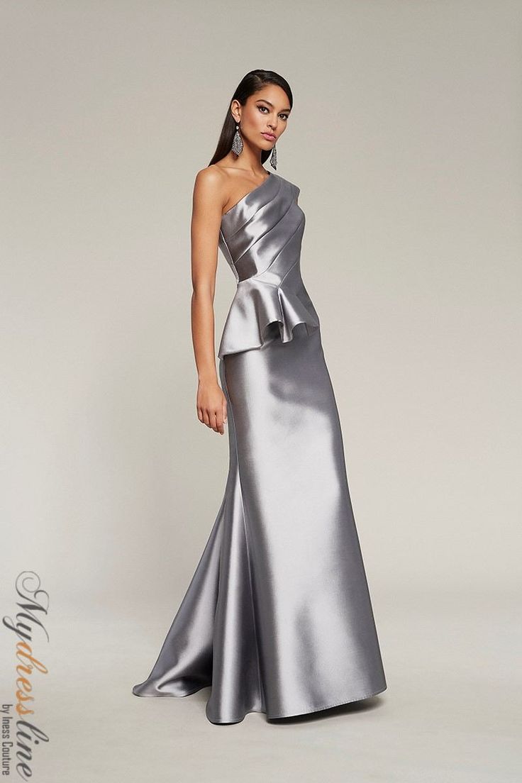 Elevate your style with Frascara 4011. This luxurious mikado fabric one-shoulder peplum mermaid dress exudes elegance. Make a statement at formal events with its glamorous silhouette. Stand out in style with this eye-catching piece. Grey Prom Dress, Silver Gown, Draped Bodice, Plastic Dress, One Shoulder Gown, Evening Dresses Elegant, Perfect Wedding Dress, Dress Cover, Mermaid Dress