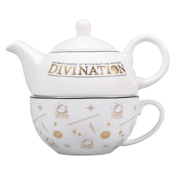 a white tea pot with gold writing on it and the words divintation written in gold