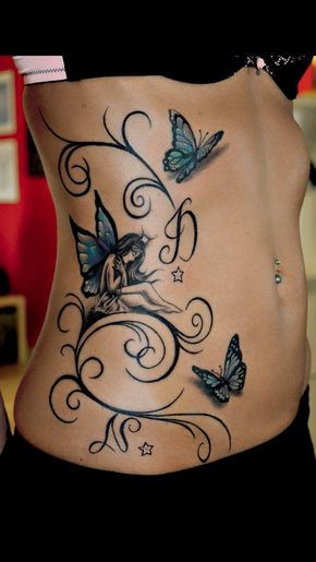 a woman's stomach with butterflies on it