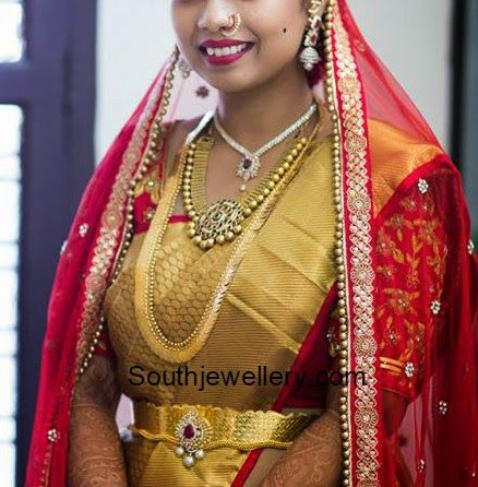 a woman in a red and gold outfit