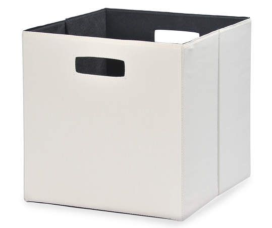 a white storage box with black handles