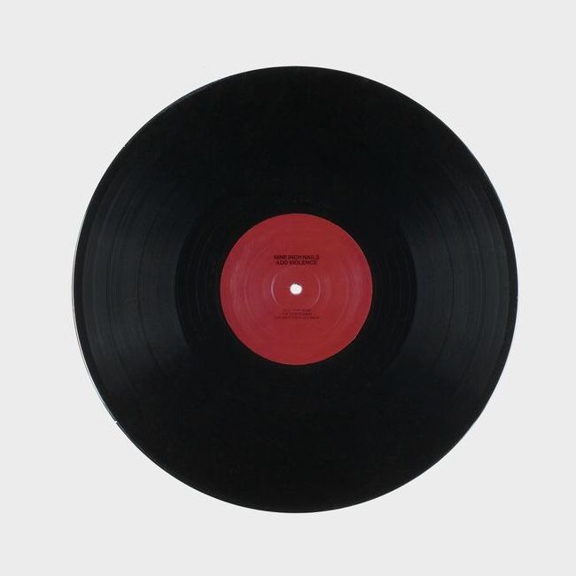 a black and red record on a white background