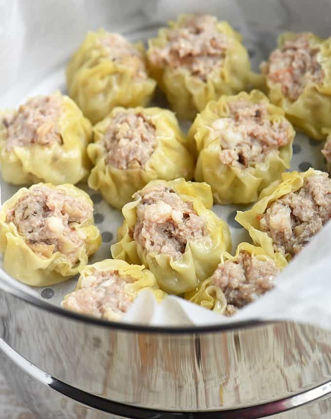 some dumplings with meat and sauce in a pot