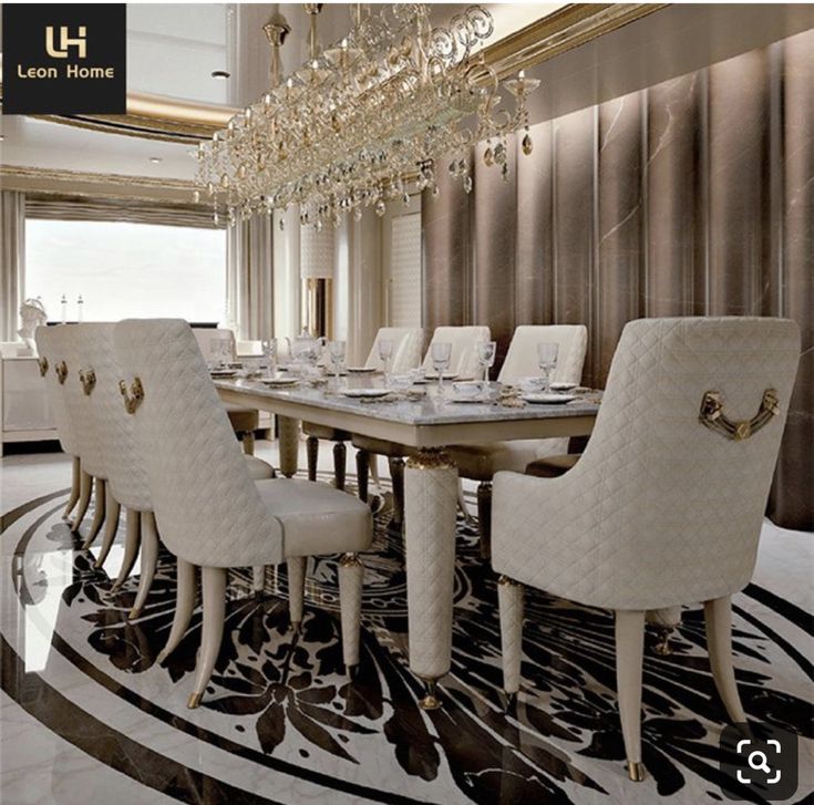 an elegant dining room with chandelier and white chairs