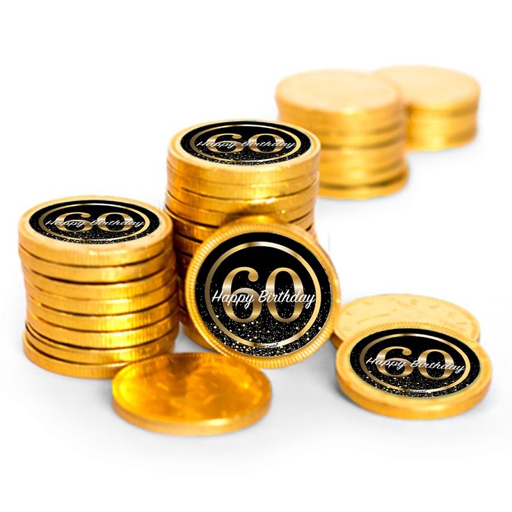 gold coins with the number thirty on them are stacked up in rows to be used as tokens