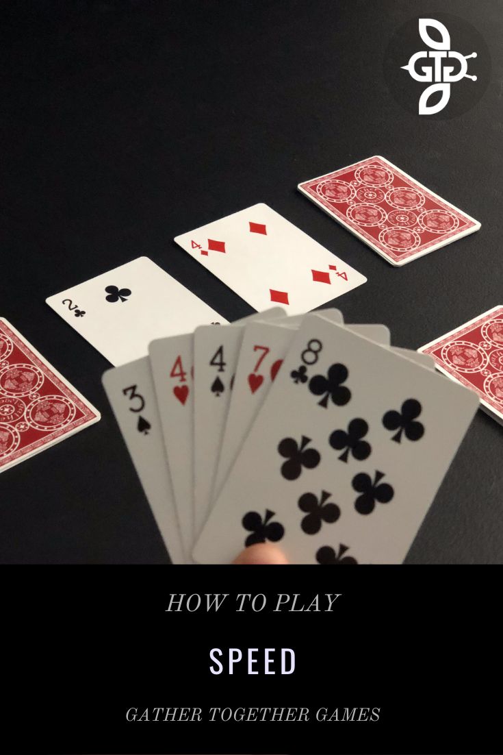 a hand holding four playing cards with the words how to play speed