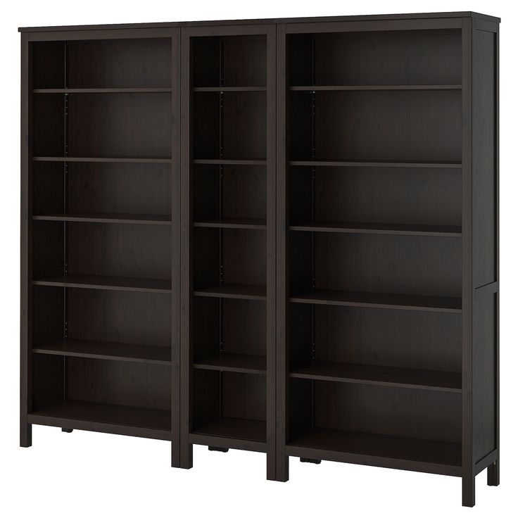 two dark brown bookcases side by side