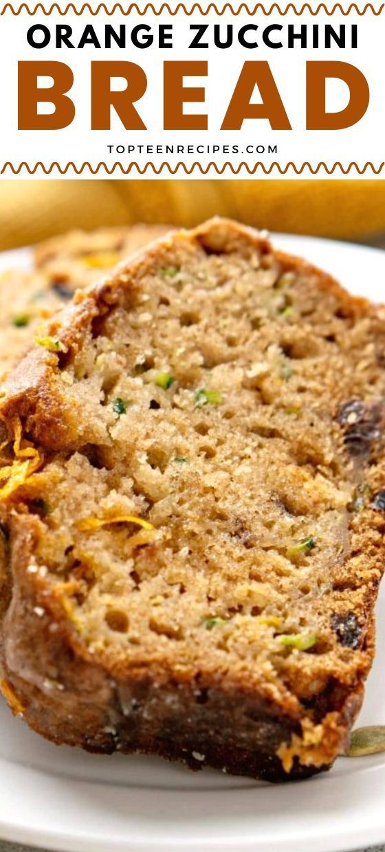 an orange zucchini bread on a white plate with a banana in the background