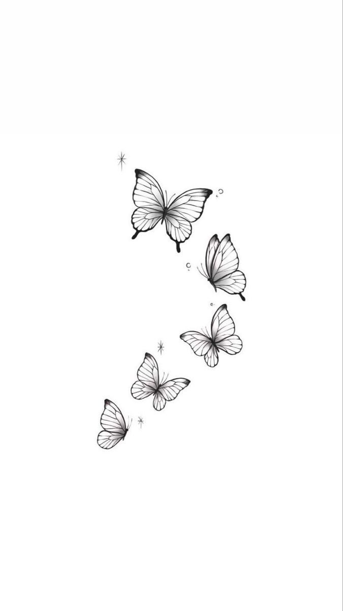 three butterflies flying in the air with one being drawn to look like it is coming out of