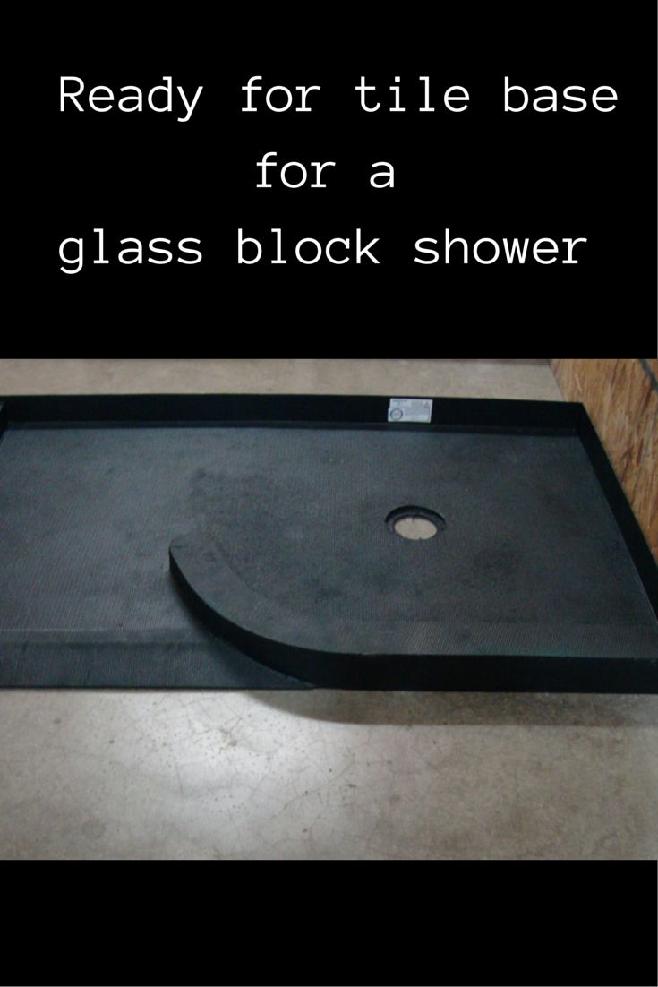 a glass block shower with the words ready for tile base for a glass block shower