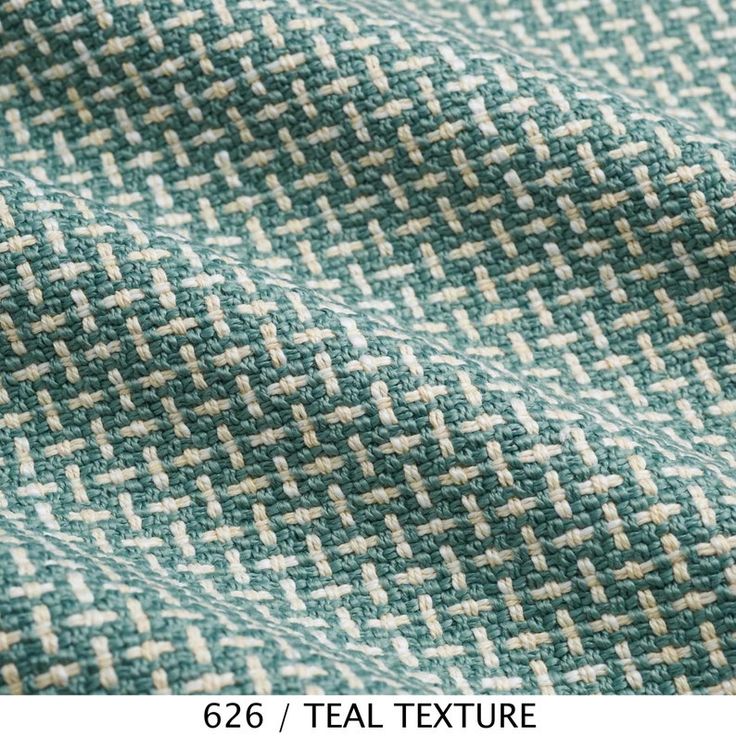 close up image of the texture of a green and white checkered tweed fabric,