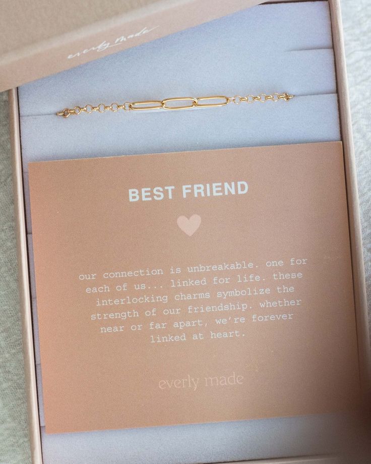 an open box with a card inside that says best friend