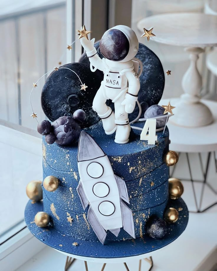 a cake that has an astronaut on it