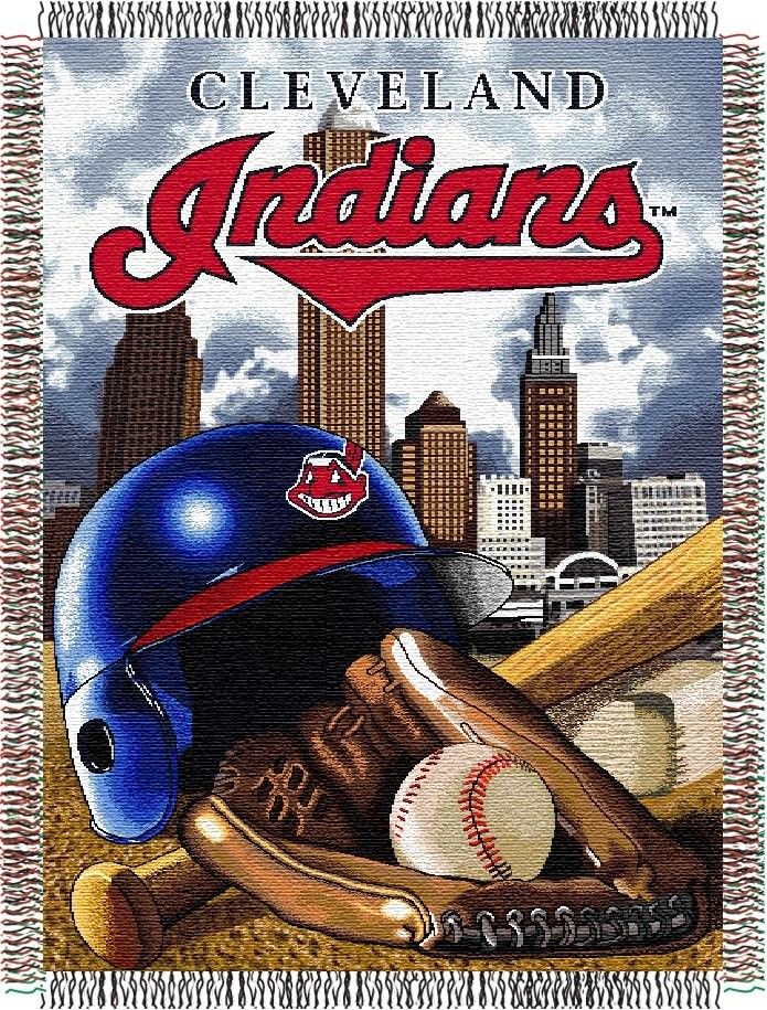 the cleveland indians throw blanket has a baseball bat, glove and helmet on it in front of a cityscape