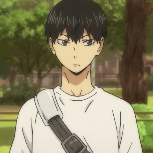 an anime character with black hair and blue eyes wearing a white t - shirt in front of trees