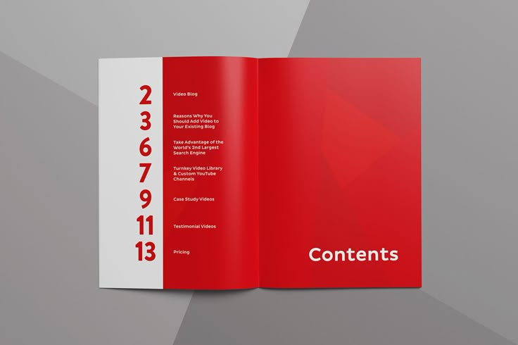 a red brochure with the words contents printed on it and an arrow pointing up