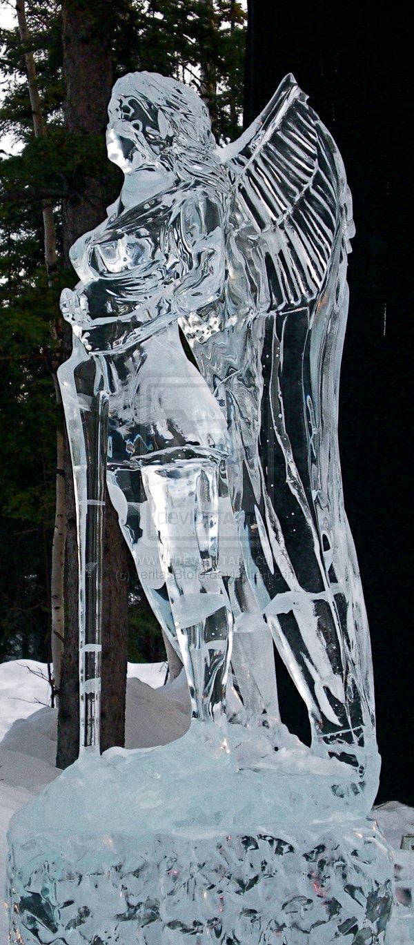 an ice sculpture is shown in the snow