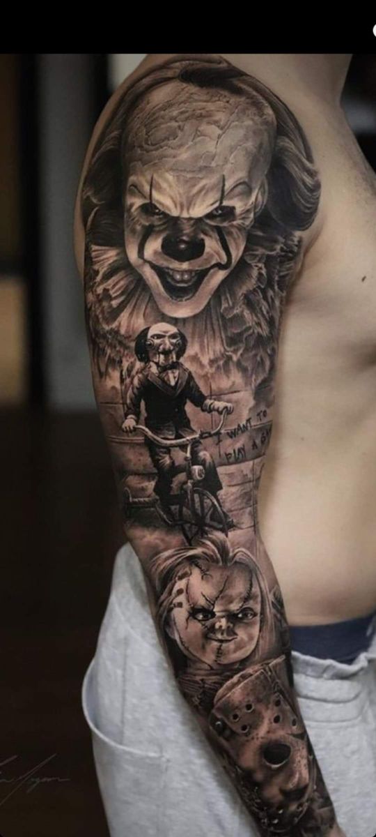 a man with a tattoo on his arm that has an image of clowns in it