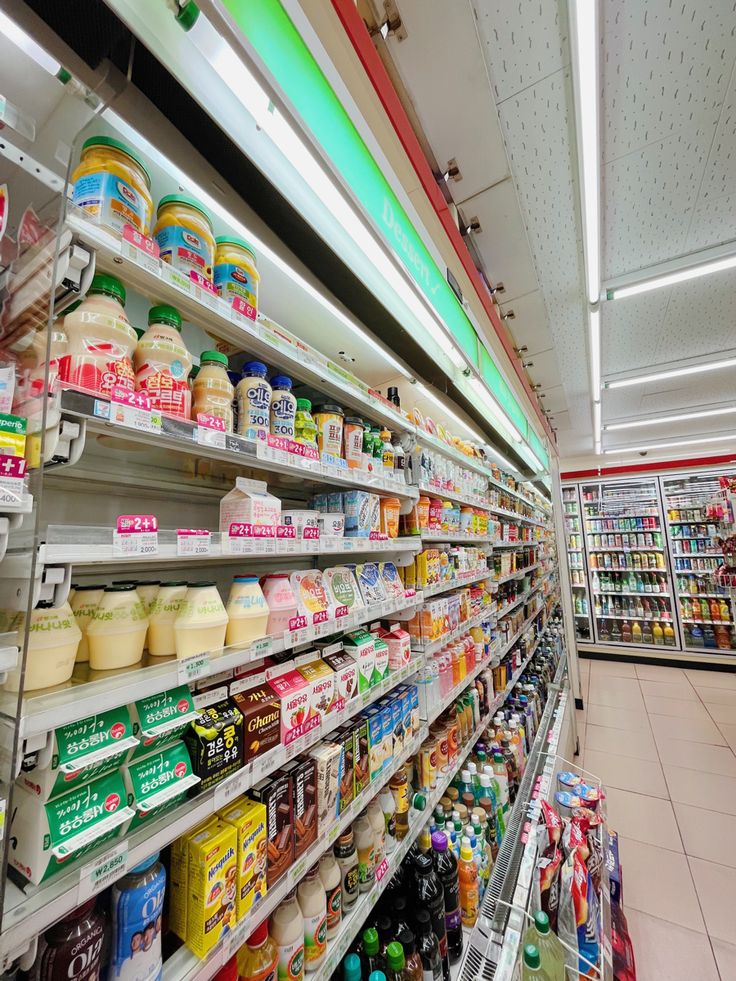 an aisle in a grocery store filled with lots of food